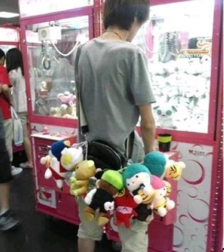 夹娃娃搞笑老板,笑料百出，娃娃机里的欢乐传奇